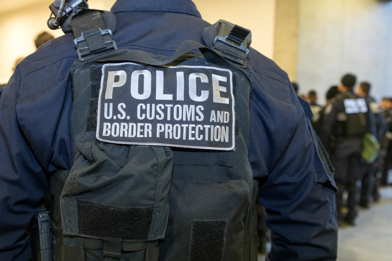 U.S. Customs and Border Protection officers manage northbound processing at the San Ysidro port of entry